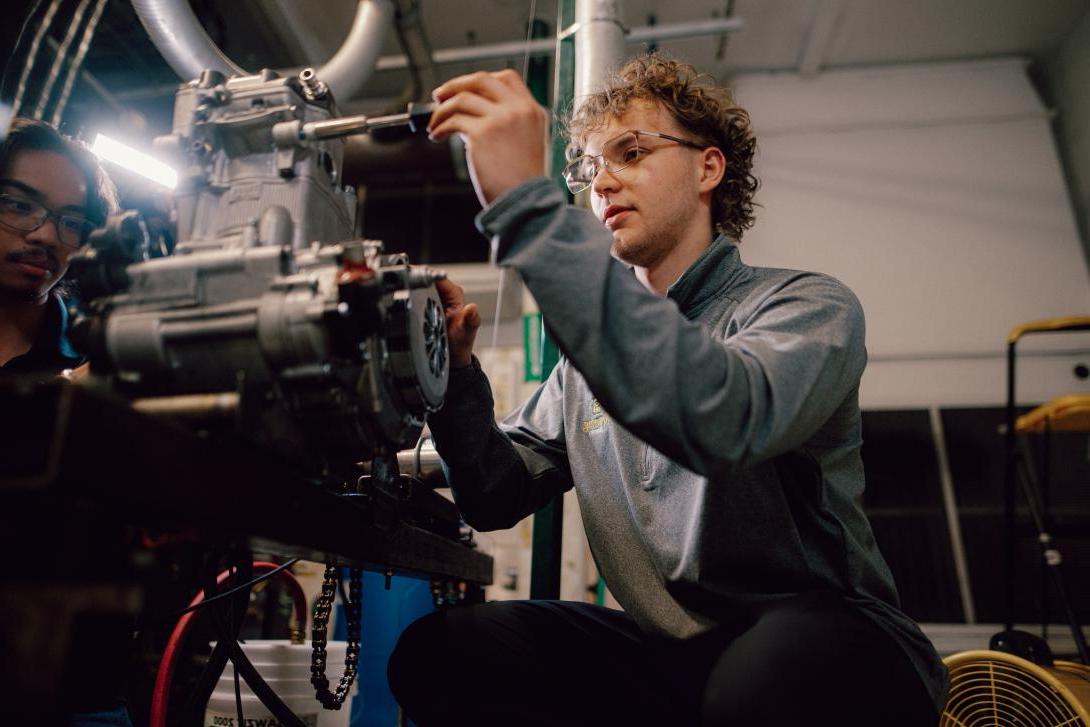 Students working in the jet engine lab