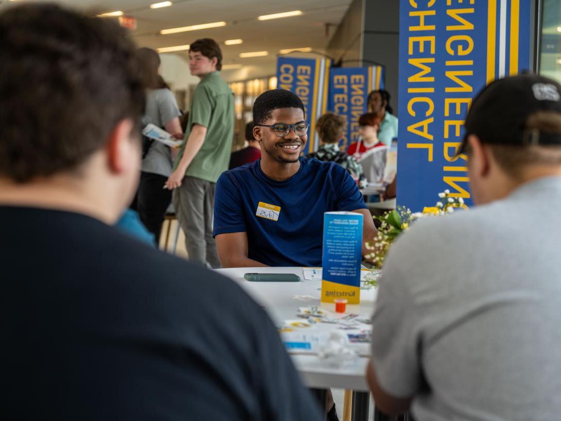 Student sitting at event